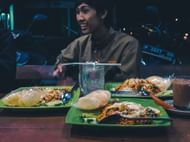 Generally eating late at night involves munching on unhealthy foods. (Image via Unsplash/ Imam Fadly)